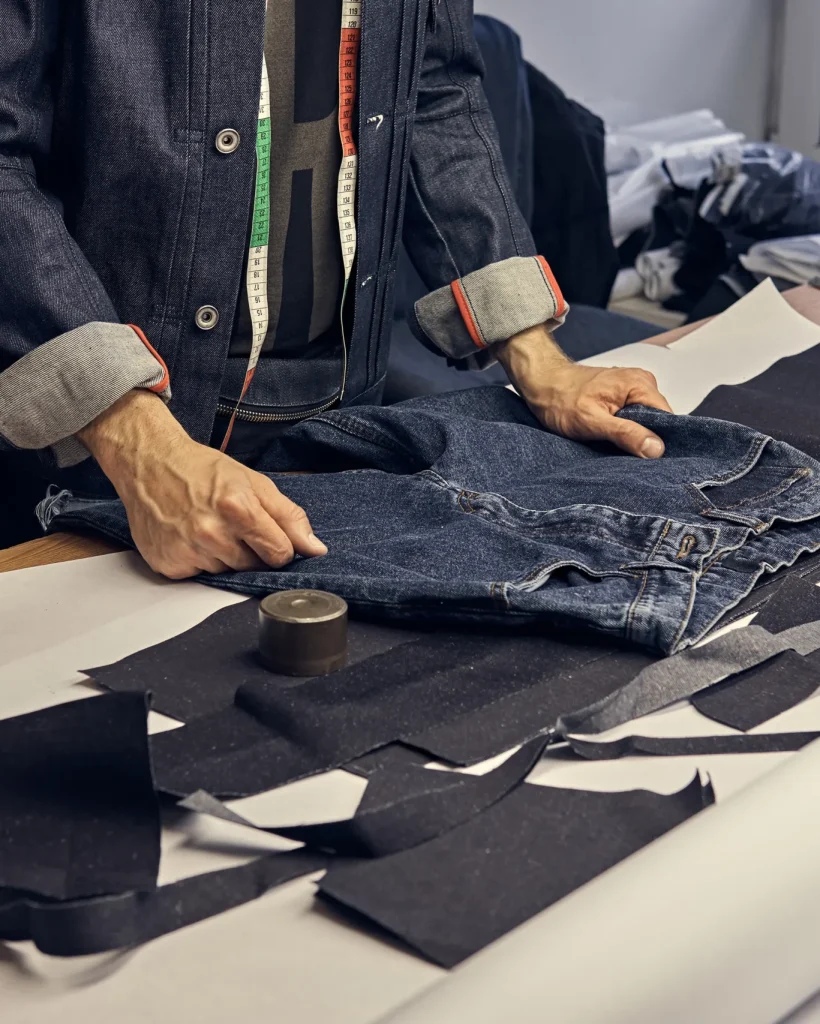 cropped-image-of-tailor-makes-measurements-of-jean-2025-01-25-02-07-04-utc